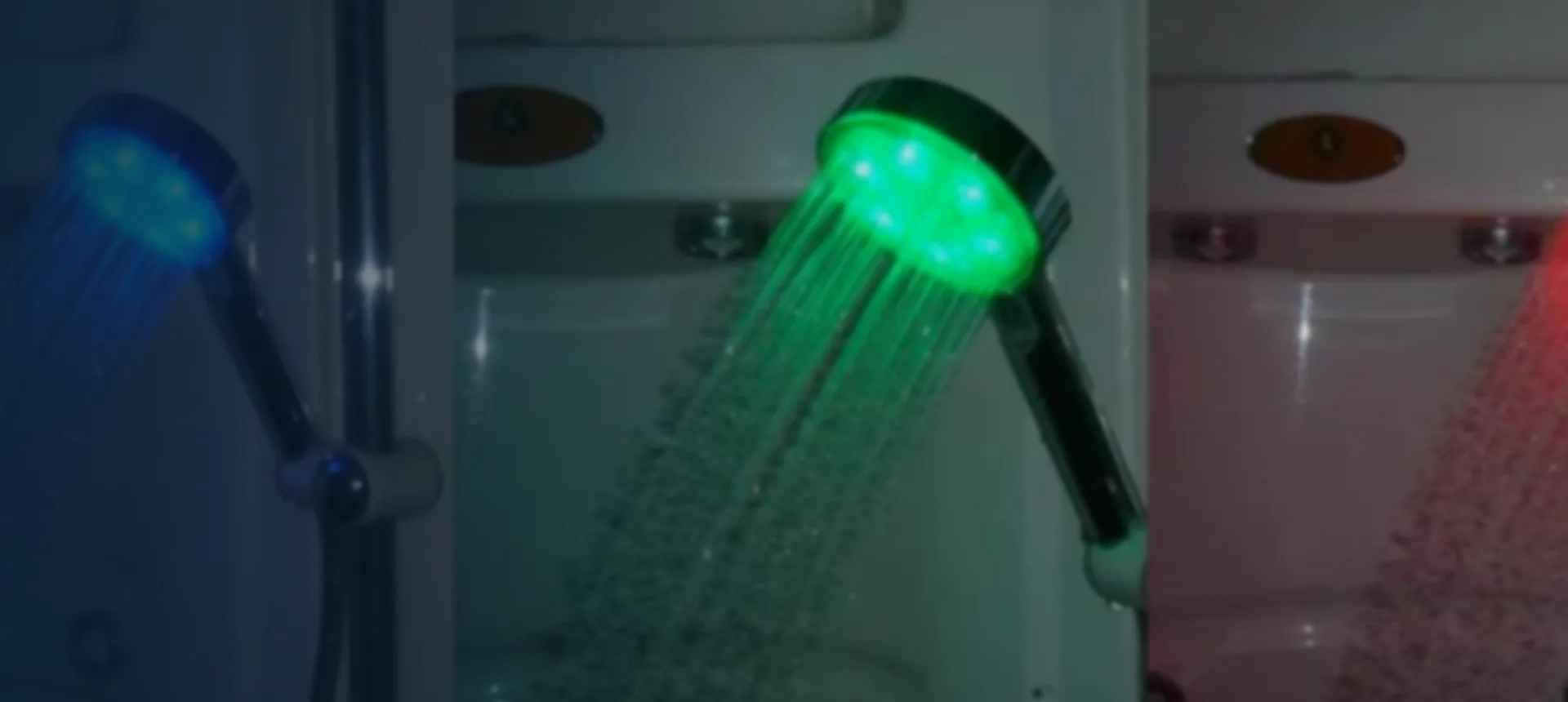 LED shower heads glowing green, blue and red according to water temperature