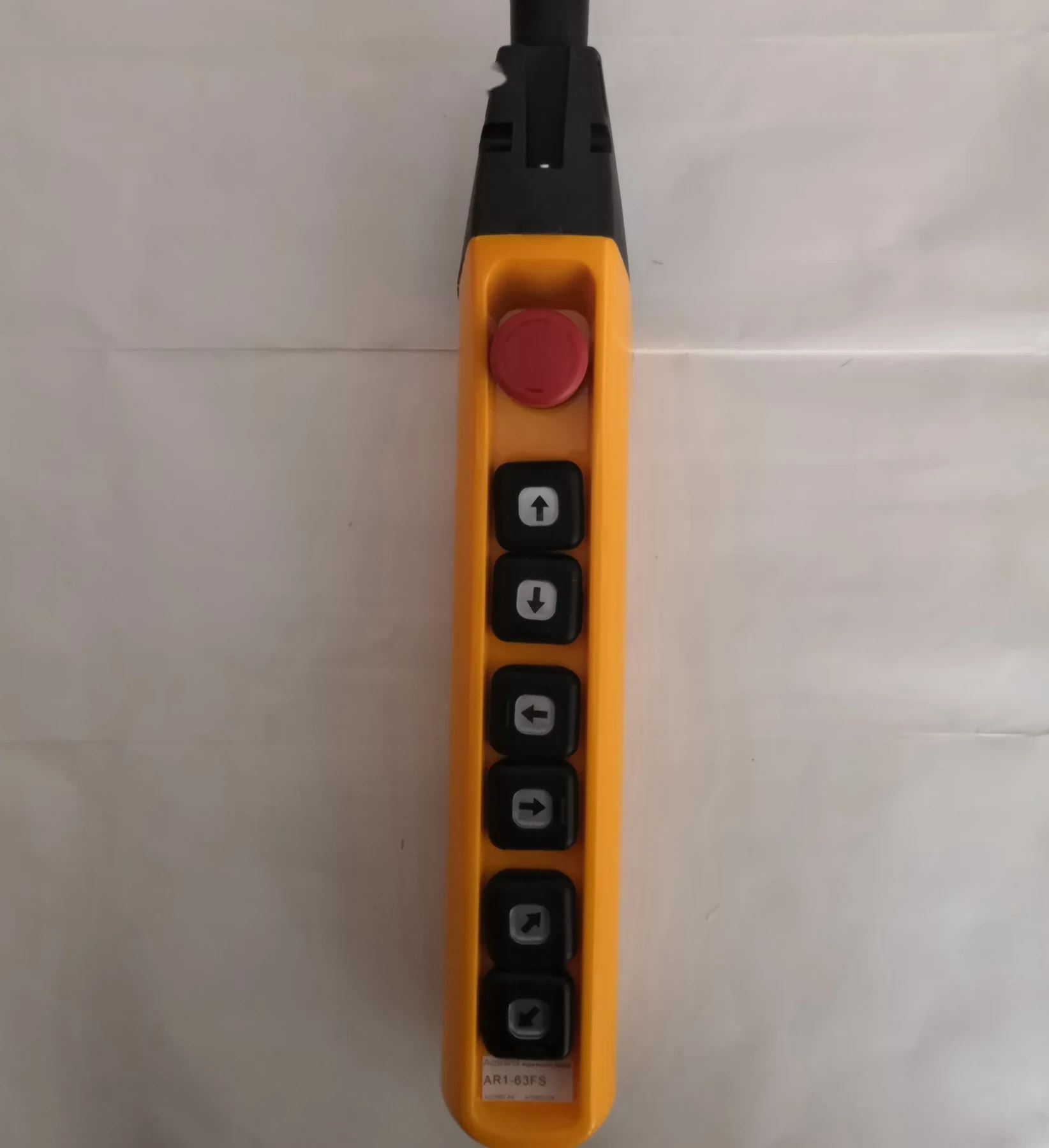 AR1-63FS wired pendant control station in yellow ABS housing with six black push buttons and emergency stop