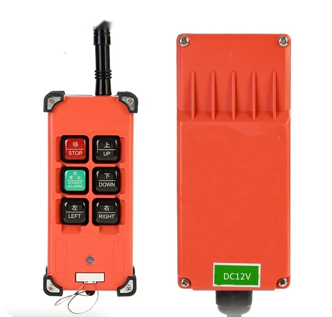 Front and back view of an orange industrial remote control with stop, start, up, down, left, and right buttons