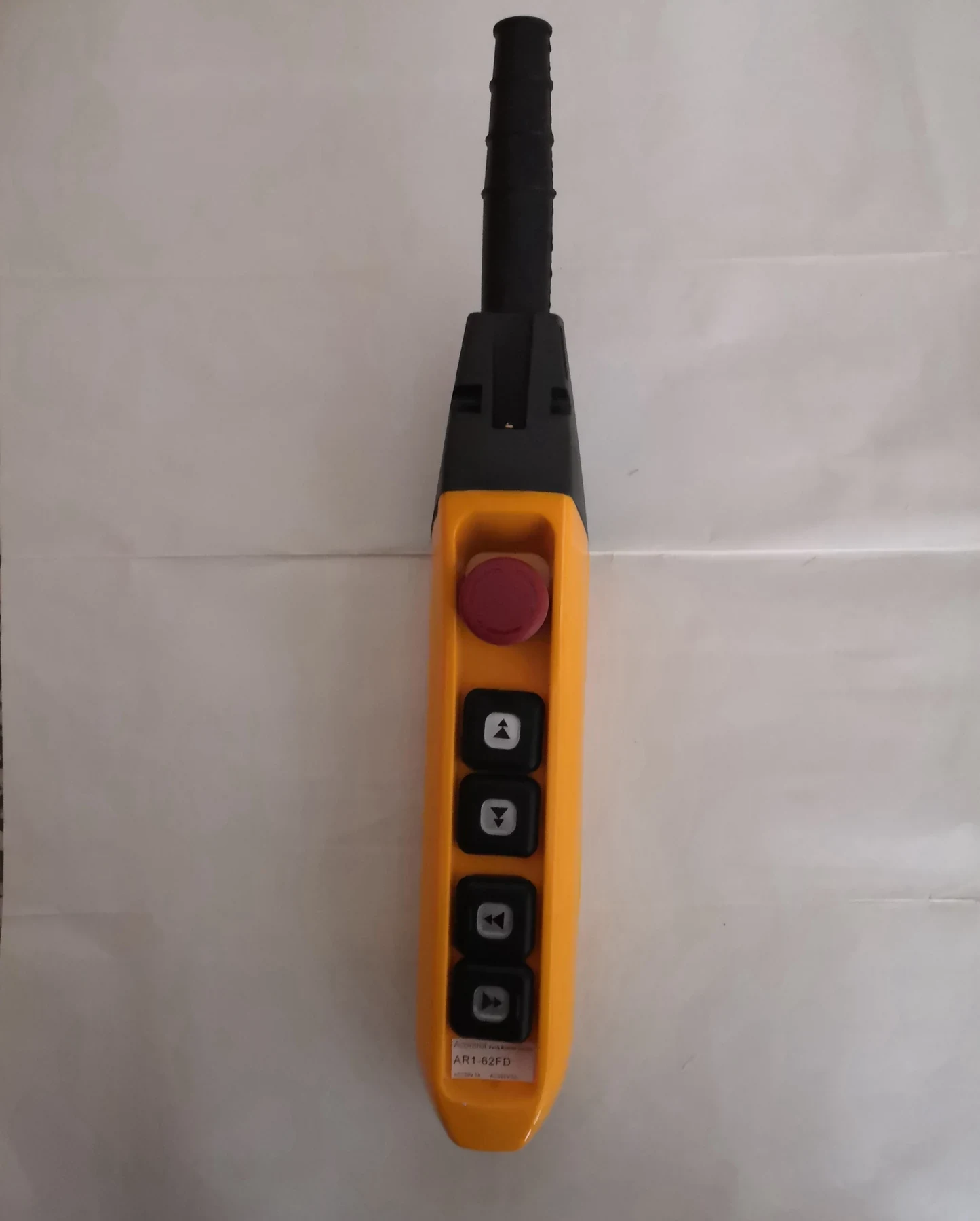 AR1-62FD pendant control station for hoist in yellow ABS housing with four black push buttons and emergency stop