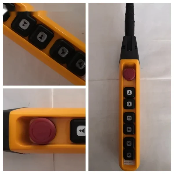 Yellow industrial pendant control station with black directional buttons and red emergency stop button on cable
