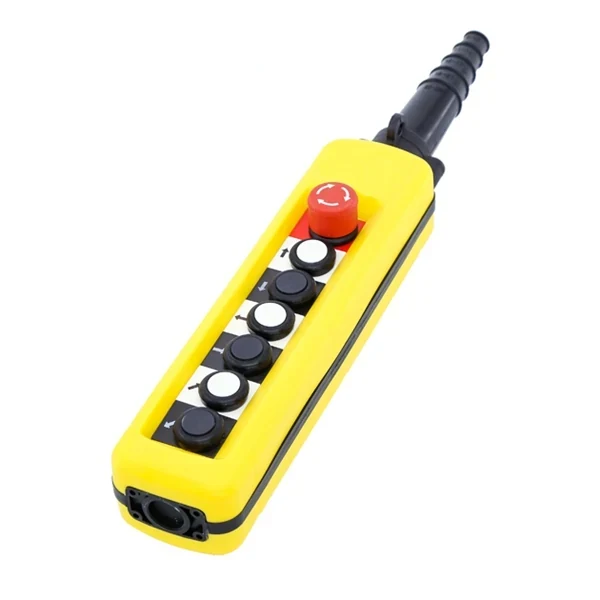 Yellow industrial pendant control station with red emergency stop button, black and white directional push buttons, and rubber cable boot, isolated on white background