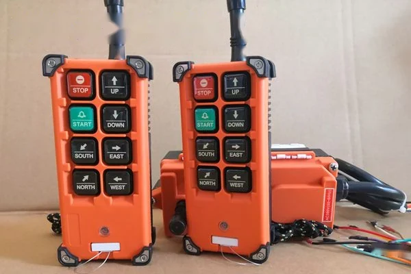 F21-E1B-2TX dual transmitter radio remote control set in yellow glass fibre housing