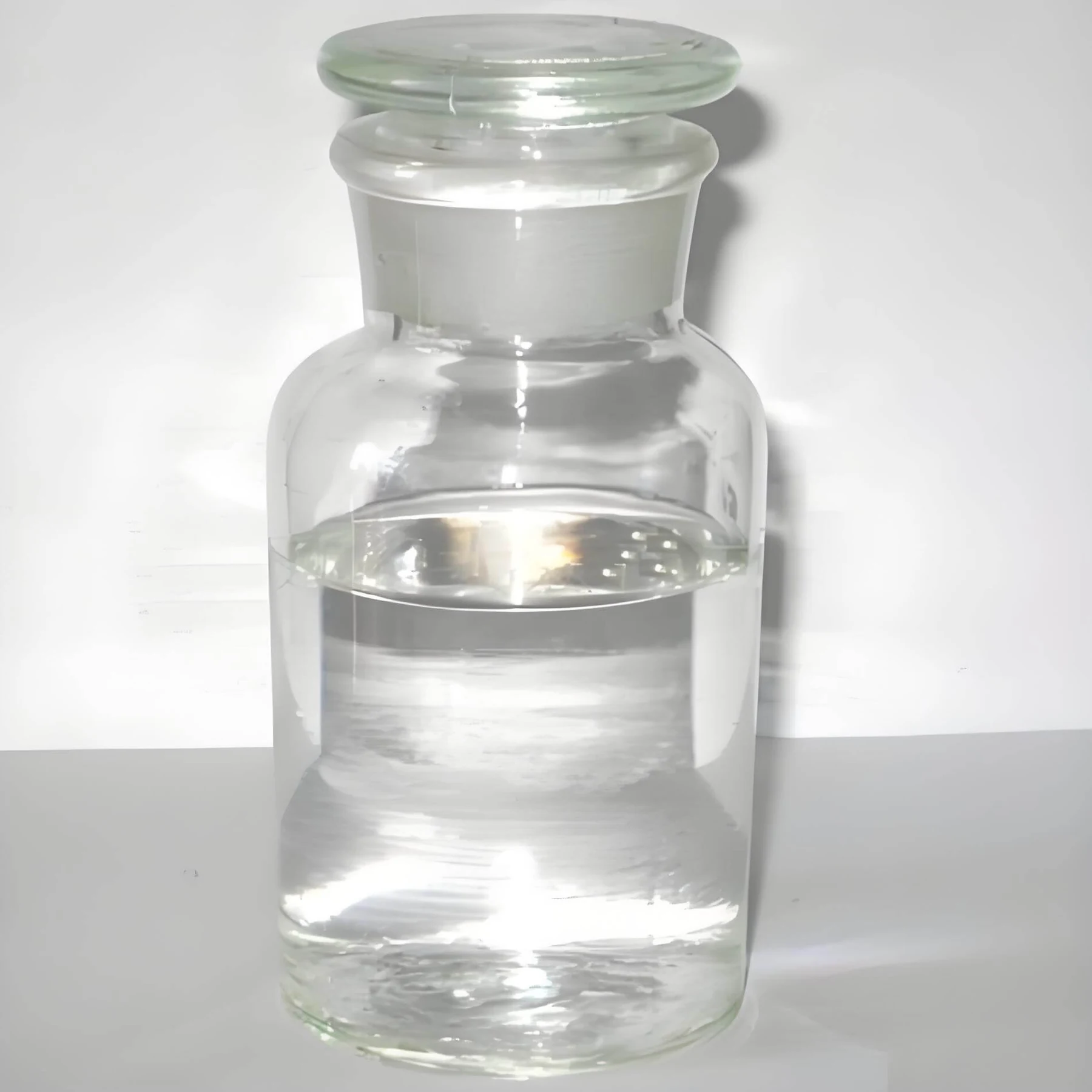 High purity phenoxyethanol clear liquid in a glass reagent bottle
