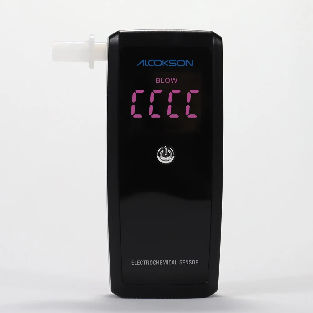 ALC-213 breath alcohol tester with mouthpiece fitted and the display counting down