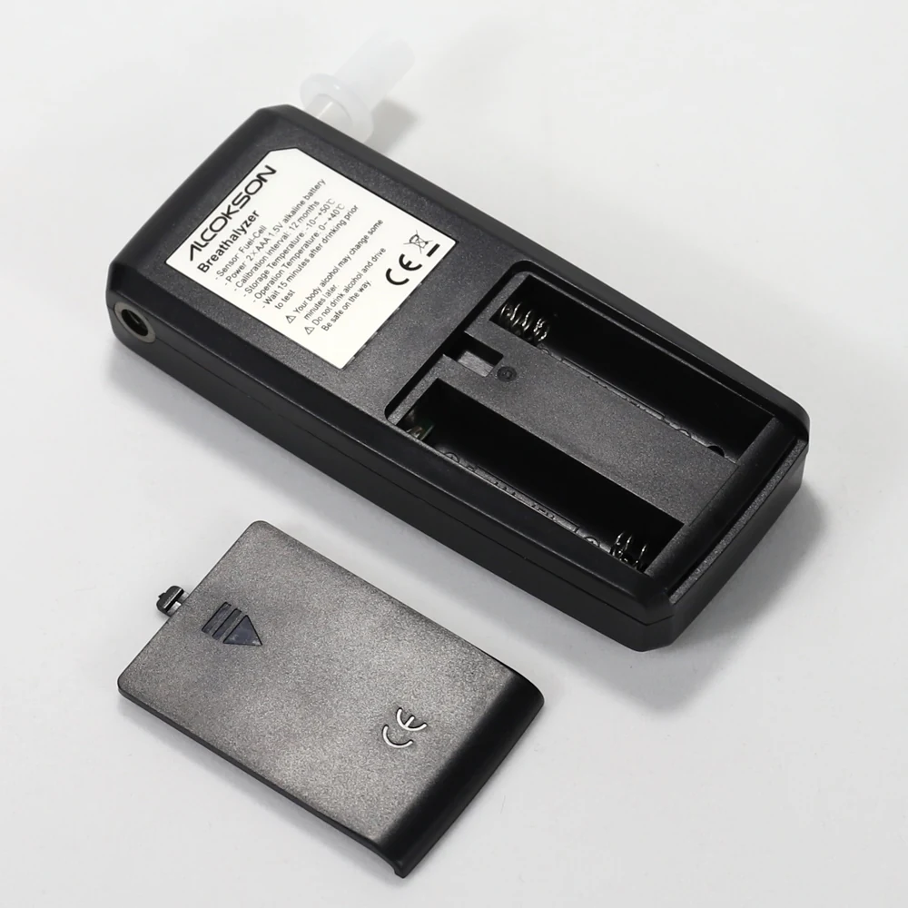 Rear of a breath alcohol tester showing the battery compartment and label