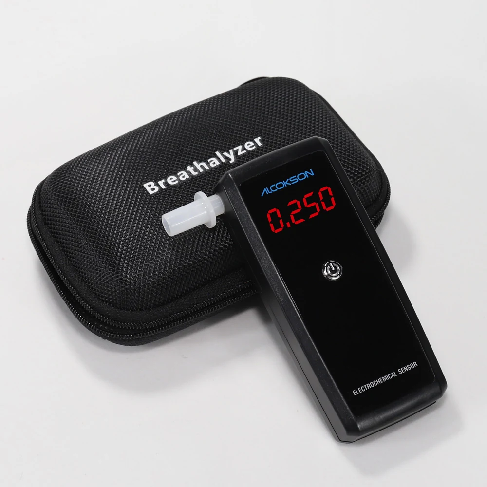 ALC-213 breath alcohol tester resting on its carry case