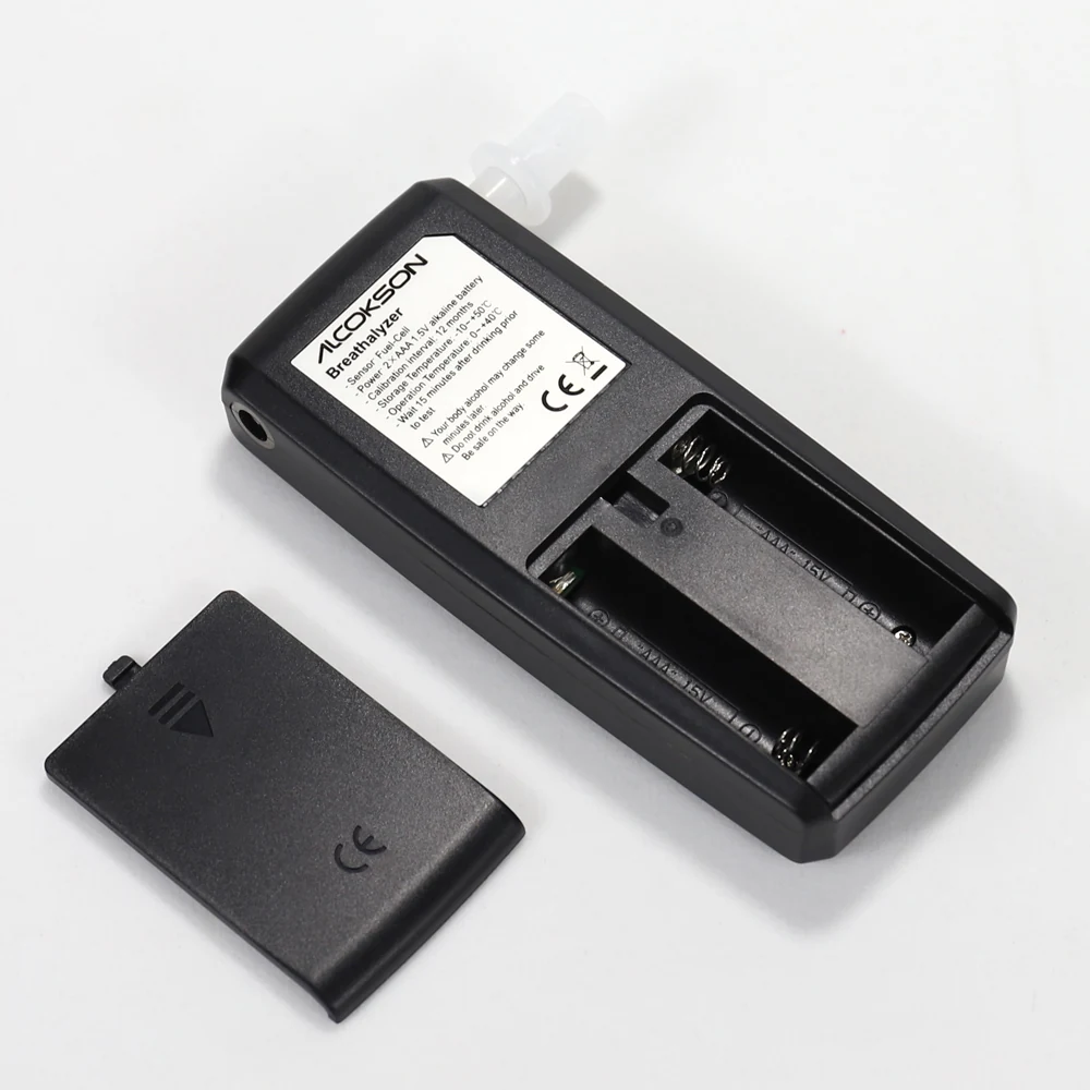 Rear of the ALC-213 breath alcohol tester with the AAA battery compartment open