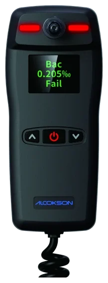 ALCOKSON vehicle alcohol interlock handset showing a breath test result
