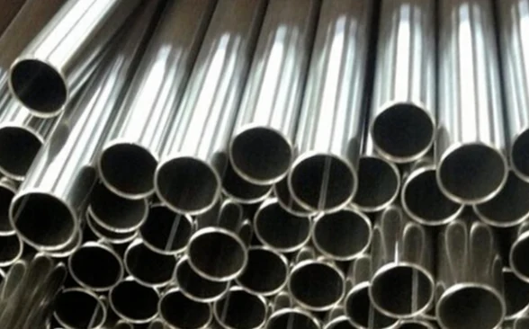 Stainless steel pipe production line with pipes on the run out table