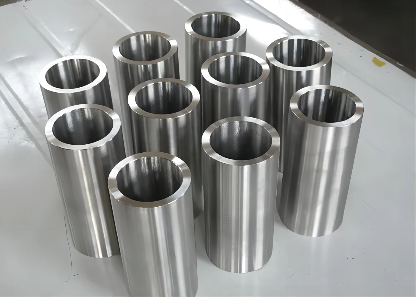 Nickel alloy N06625 Inconel 625 pipe sections stacked for inspection