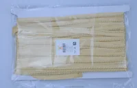Bundle of gold metallic trim in a clear plastic bag with a label.
