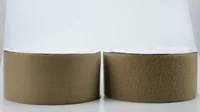Two tan hook-and-loop fastener tape rolls side by side on a white background
