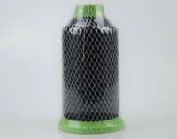 Large spool of black thread wrapped in white mesh netting with green plastic cone ends, on a plain light background