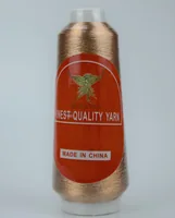 Copper metallic yarn cone with orange MUSATEX label reading FINEST QUALITY YARN and MADE IN CHINA