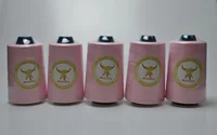 Five pink sewing thread cones with MUSATEX phoenix labels lined up on a white background