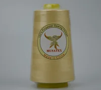 Cream polyester sewing thread cone with MUSATEX phoenix label reading 100% Polyester Sewing Thread, Made in China