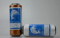 Two spools of thread, one brown and one white, with blue labels on a gray background.
