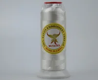 Spool of white MUSATEX 100% rayon embroidery thread.