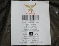MUSATEX paper label on black