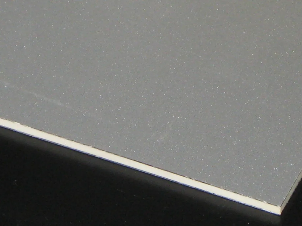 Class A2 fire-rated aluminum composite panel edge showing the mineral core