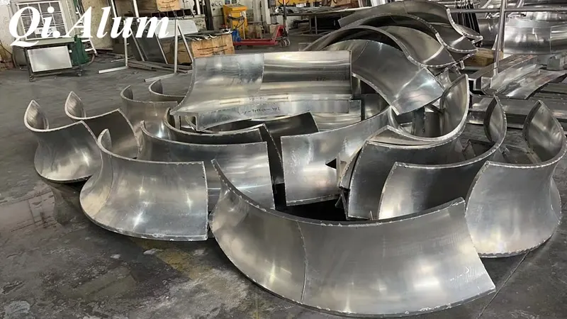 The Innovation and Applications of Double-Curved Aluminum Single Panels — Foshan Qi Aluminum Decorative Materials Co., Ltd