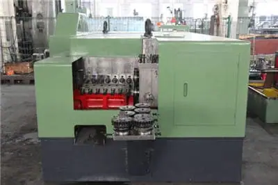 Round coupling nuts forming machine