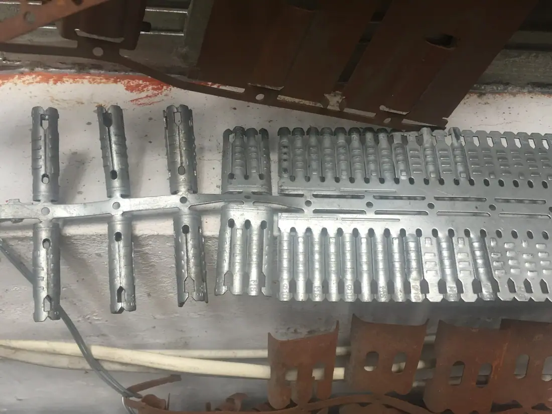 Anti skid rips shield anchor sleeves progressive stamping die