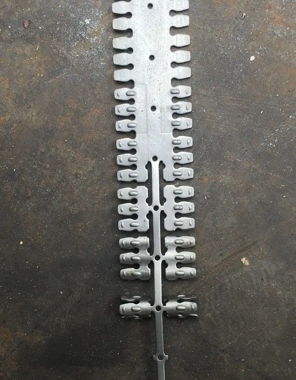 Wedge anchor clips made by high speed progressive stamping die