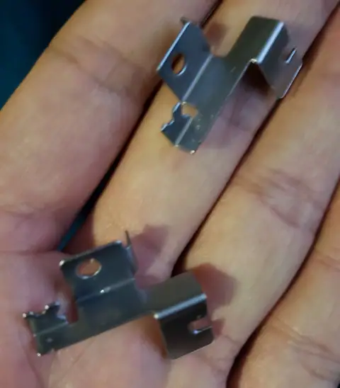 Multi angle bent clip progressive stamping press with dice