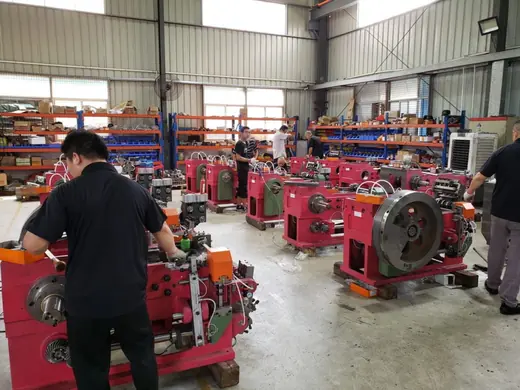 Assembly technicians building up machine frames at the Anchors Machinery works in Ningbo China