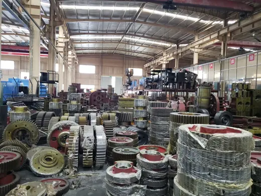 Gears, pulleys and wheel components held in the parts area at the Anchors Machinery works in Ningbo China