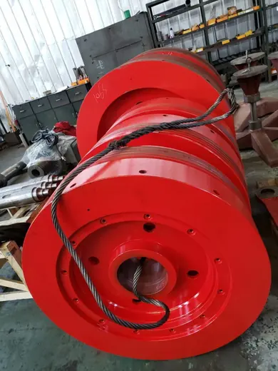 Painted flywheel and drive pulley assemblies at the Anchors Machinery works in Ningbo China
