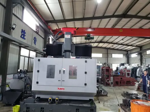 Enclosed CNC machining centre in the finishing bay at the Anchors Machinery works in Ningbo China