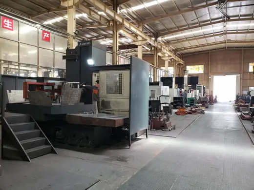 Boring and milling machines lined along the central aisle at the Anchors Machinery works in Ningbo China