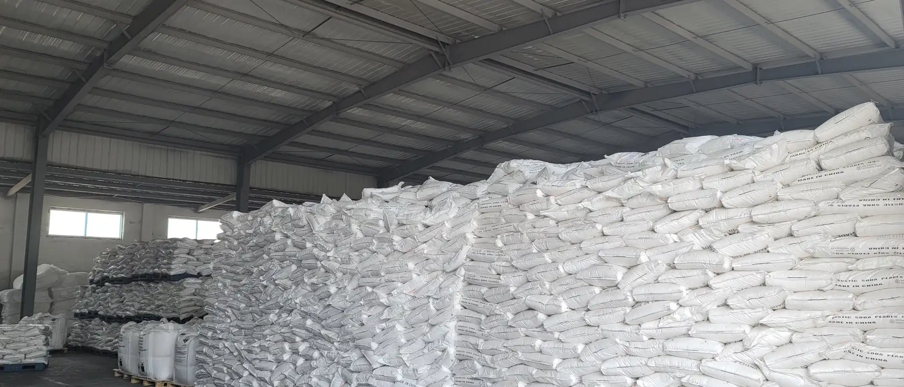 Jumbo bags of caustic soda stacked in the ArtChems warehouse in Tianjin China