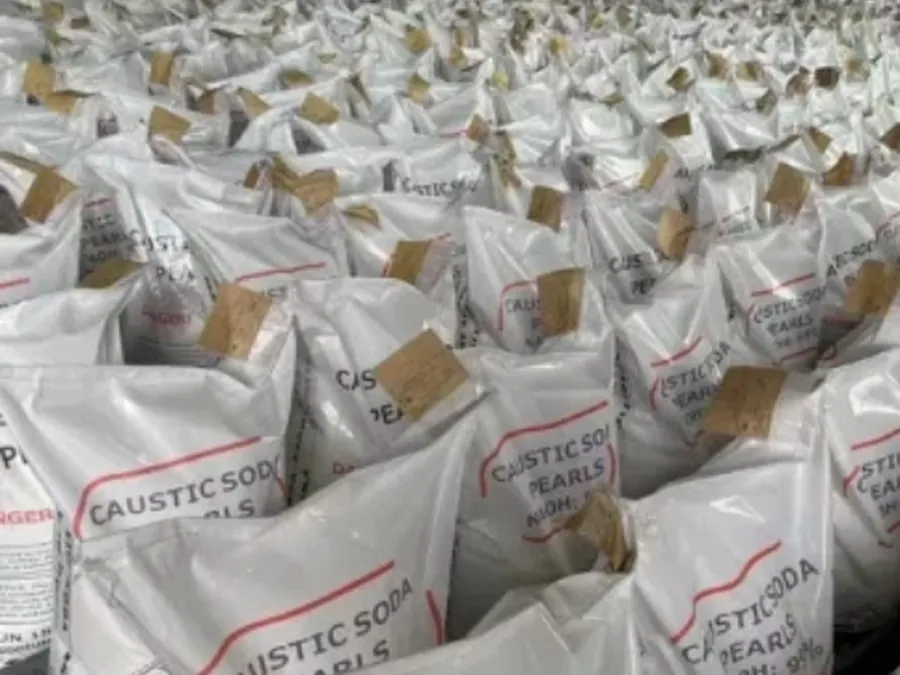 Palletised caustic soda pearls held in our covered warehouse