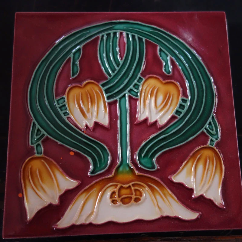 Small hand painted ceramic tile in deep red glaze for coaster use