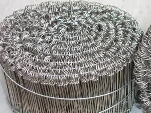 Coil of black annealed wire viewed from above