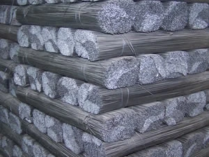 Bundles of straight cut black wire on a pallet