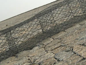 Gabion wall built along a stone bank