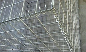 Welded gabion basket with spiral binder closing the lid