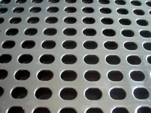 Perforated metal sheet with slotted holes