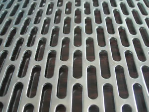 Perforated metal sheet in a slotted pattern close up