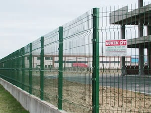 Welded mesh fence line along a construction boundary