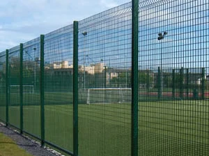 Welded mesh fence enclosing a sports field