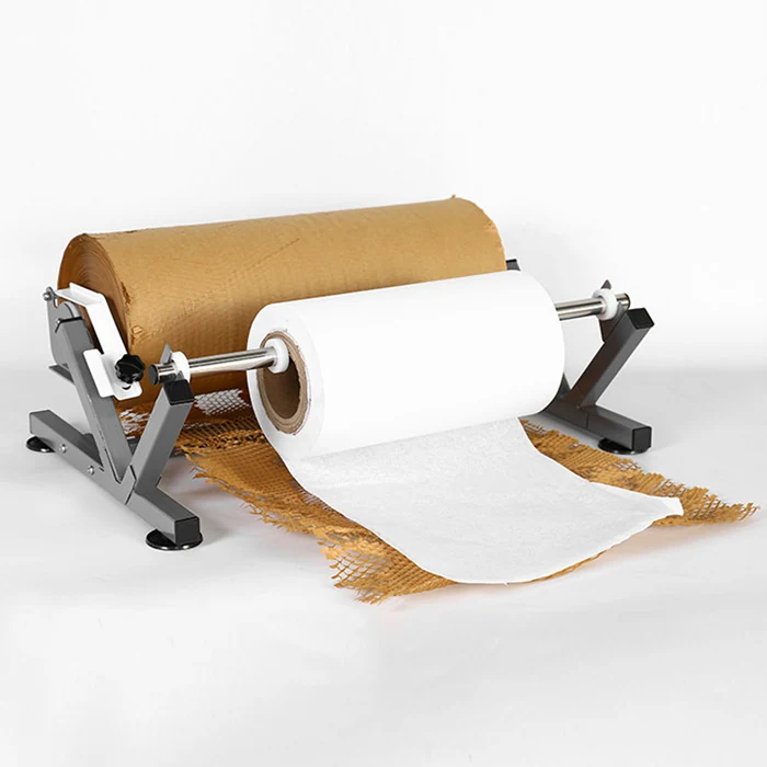 Metal floor stand dispenser holding a kraft paper roll and a white paper roll with sheets unrolled forward
