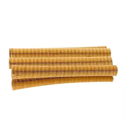 Stacked rolls of brown honeycomb packing paper