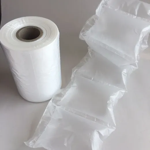Roll of white air cushion film next to an inflated air pillow strip on a plain white background