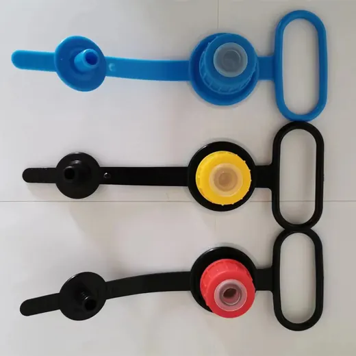 Three plastic jerrycan cap seals with carrying handles: blue, black with yellow cap, black with red cap